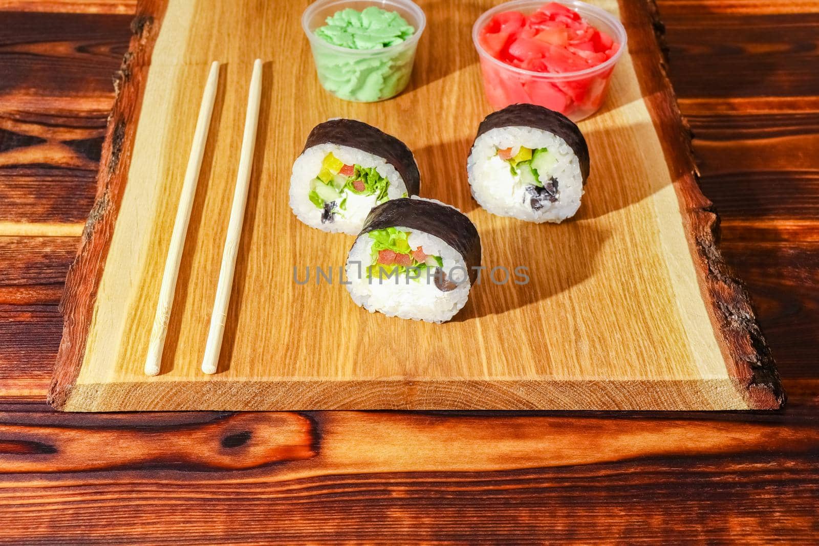 sushi on a wooden background close up by roman112007