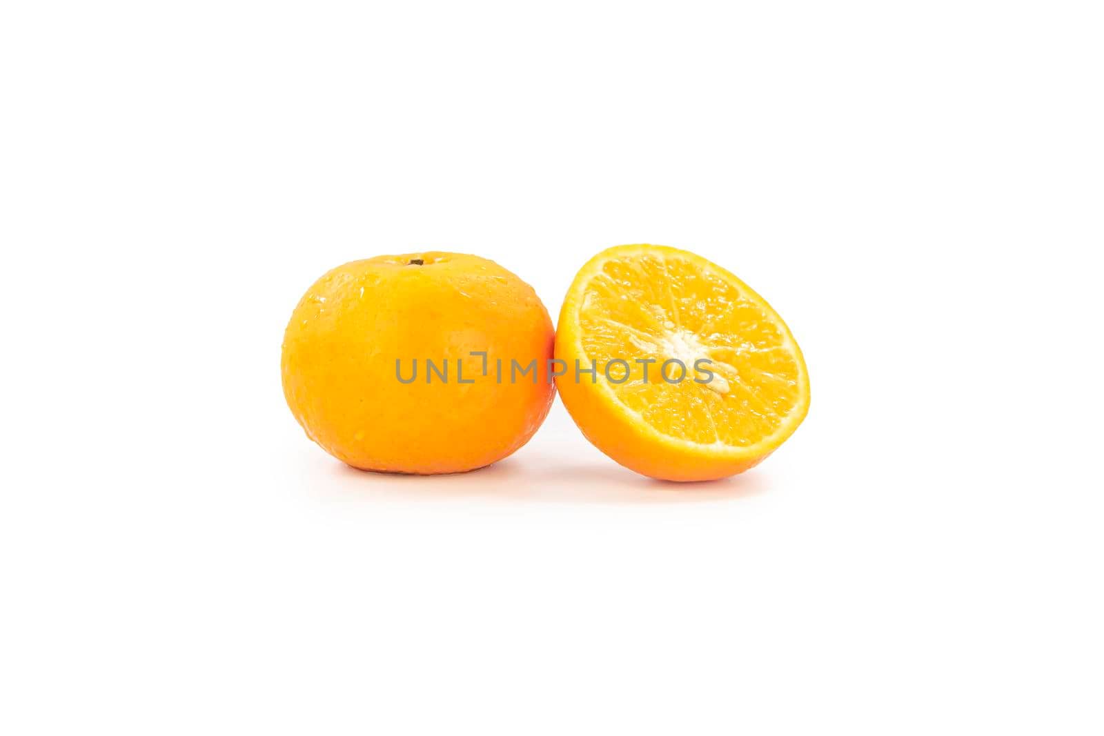 Fresh yellow orange isolated on white background.
