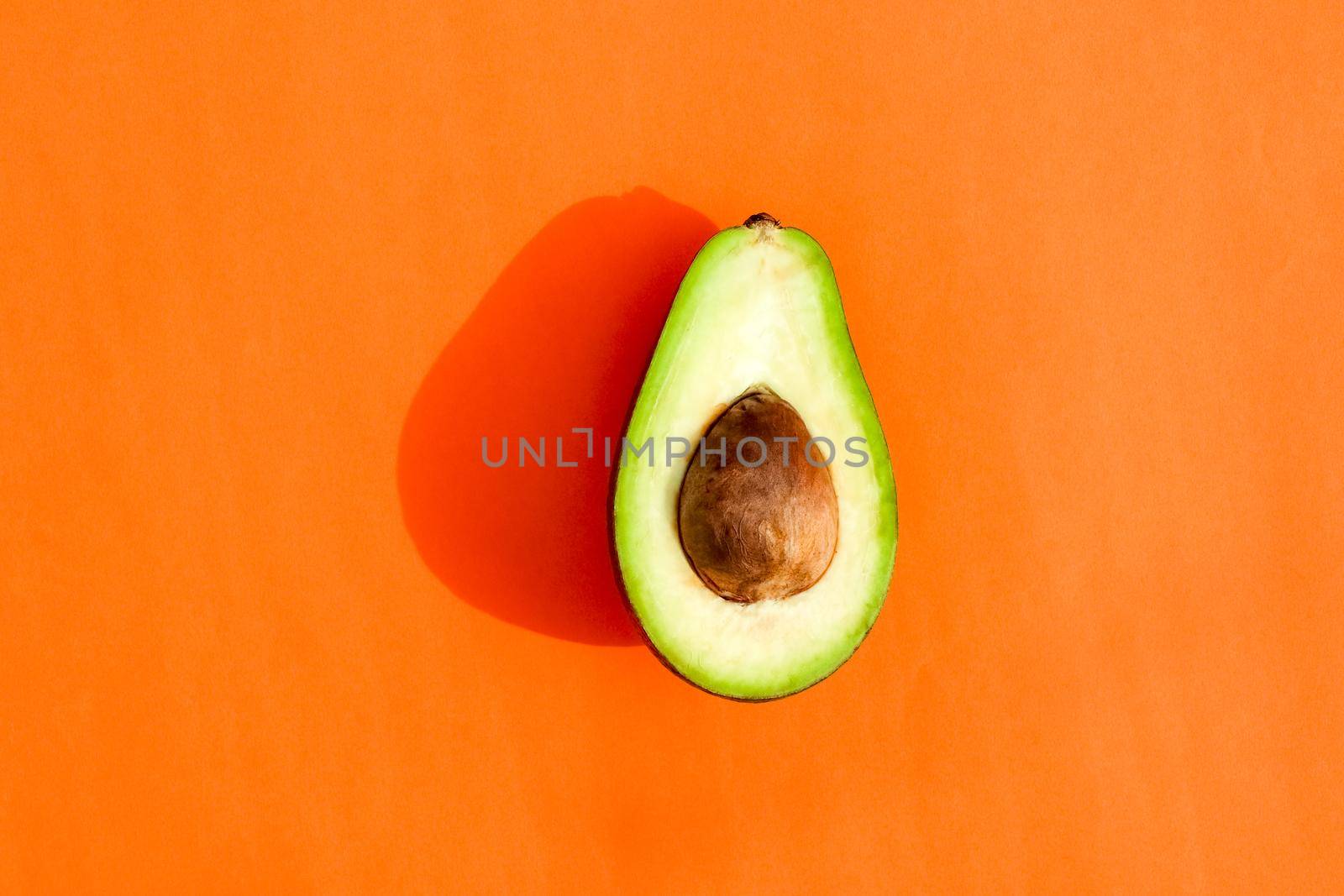 avocado color on a solid background, the top view pattern. High quality photo