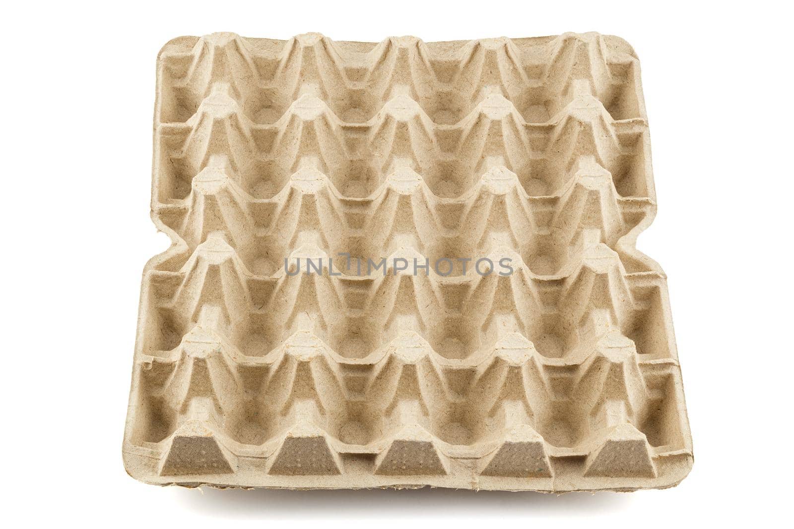 empty formed cardboard egg tray - closeup with edge-to-edge sharpness, isolated on white background.