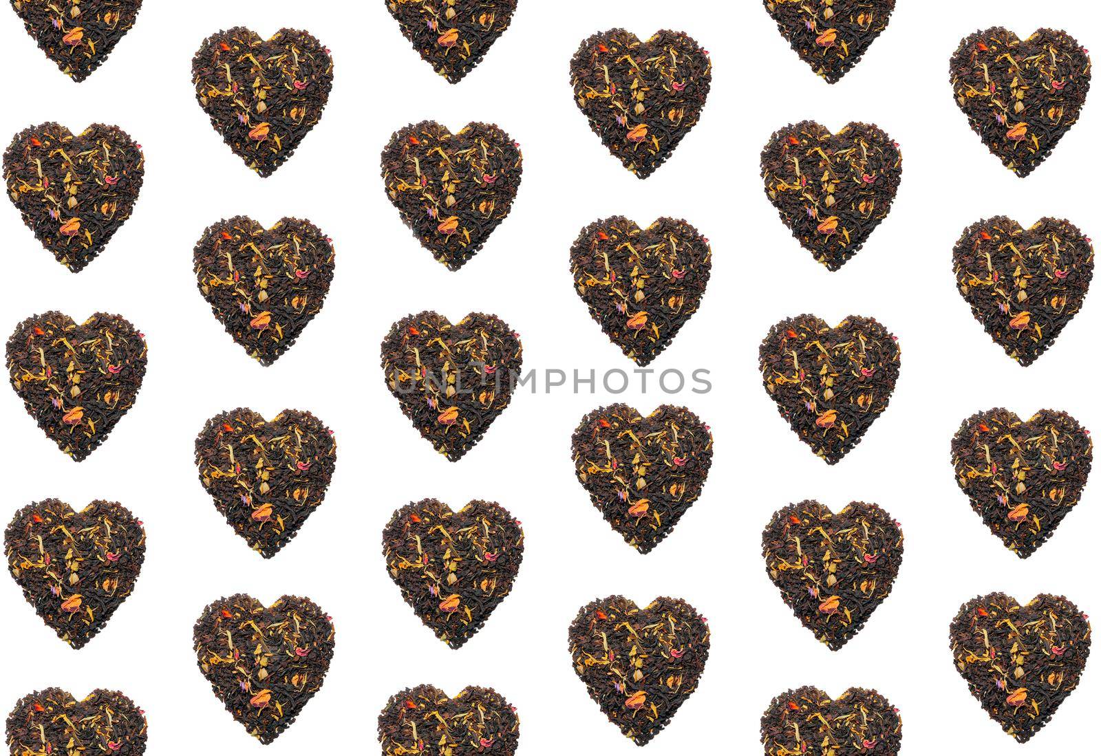 colorful pattern of tea hearts on a black background top view by roman112007