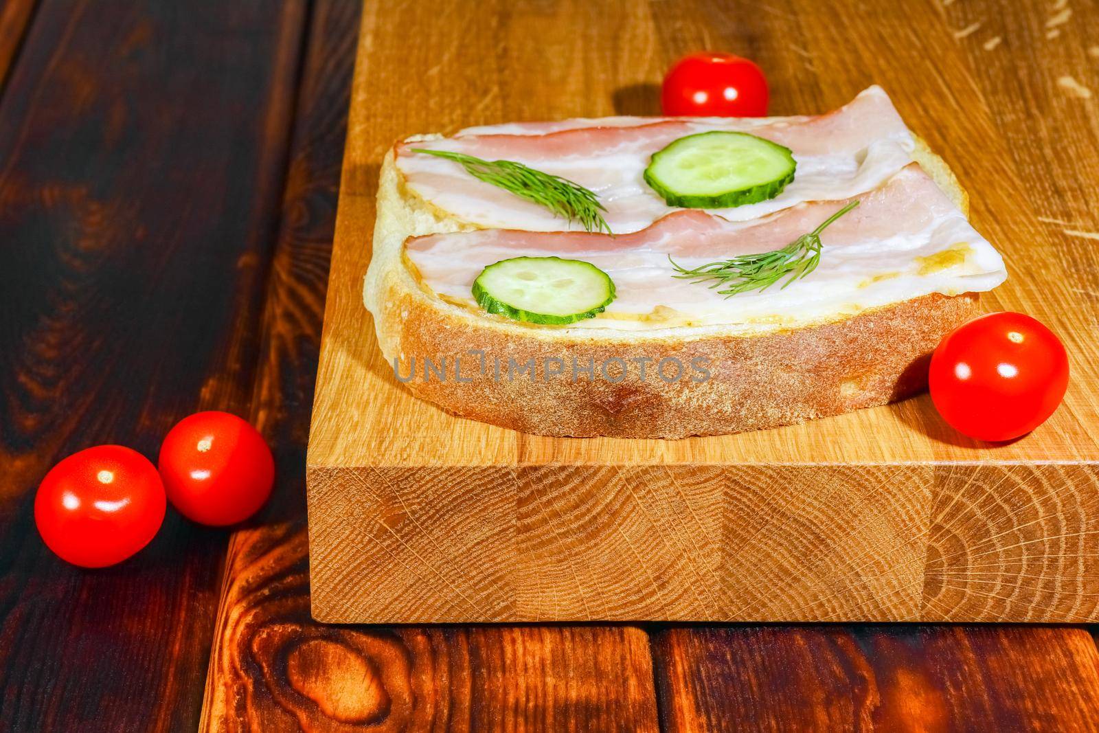 sandwich on the cutting Board as background by roman112007