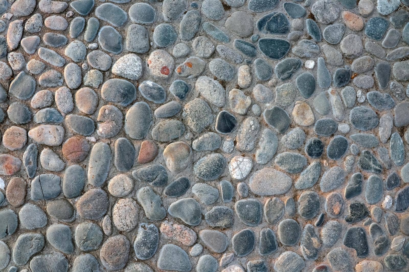 masonry wall paving stones as a background close up by roman112007