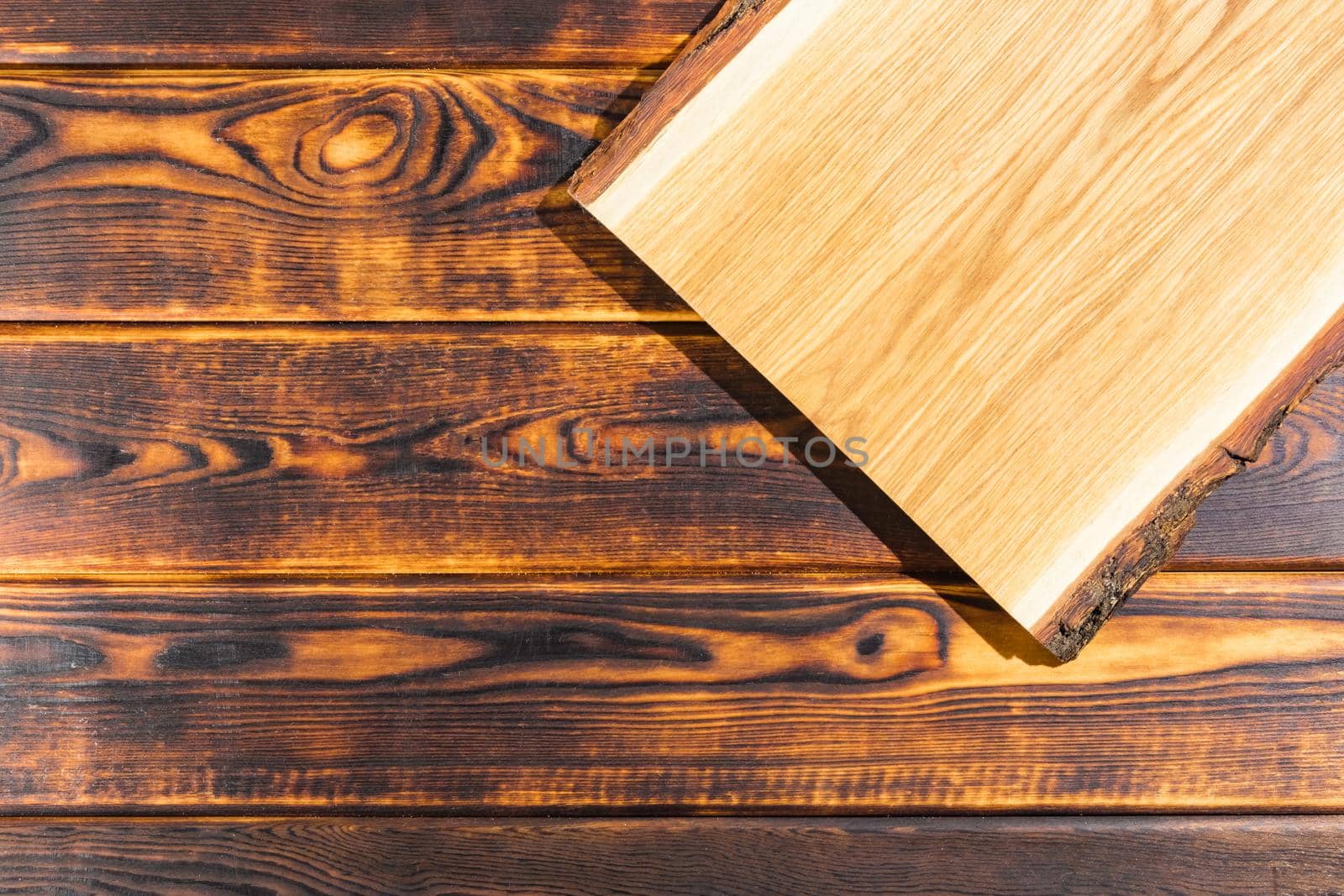 cutting Board on a wooden background top view. High quality photo