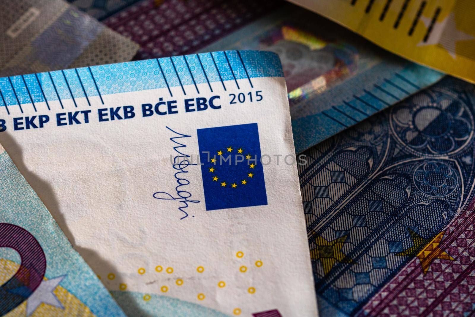 Close up of money euro banknotes, background of money euro isolated. by vladispas