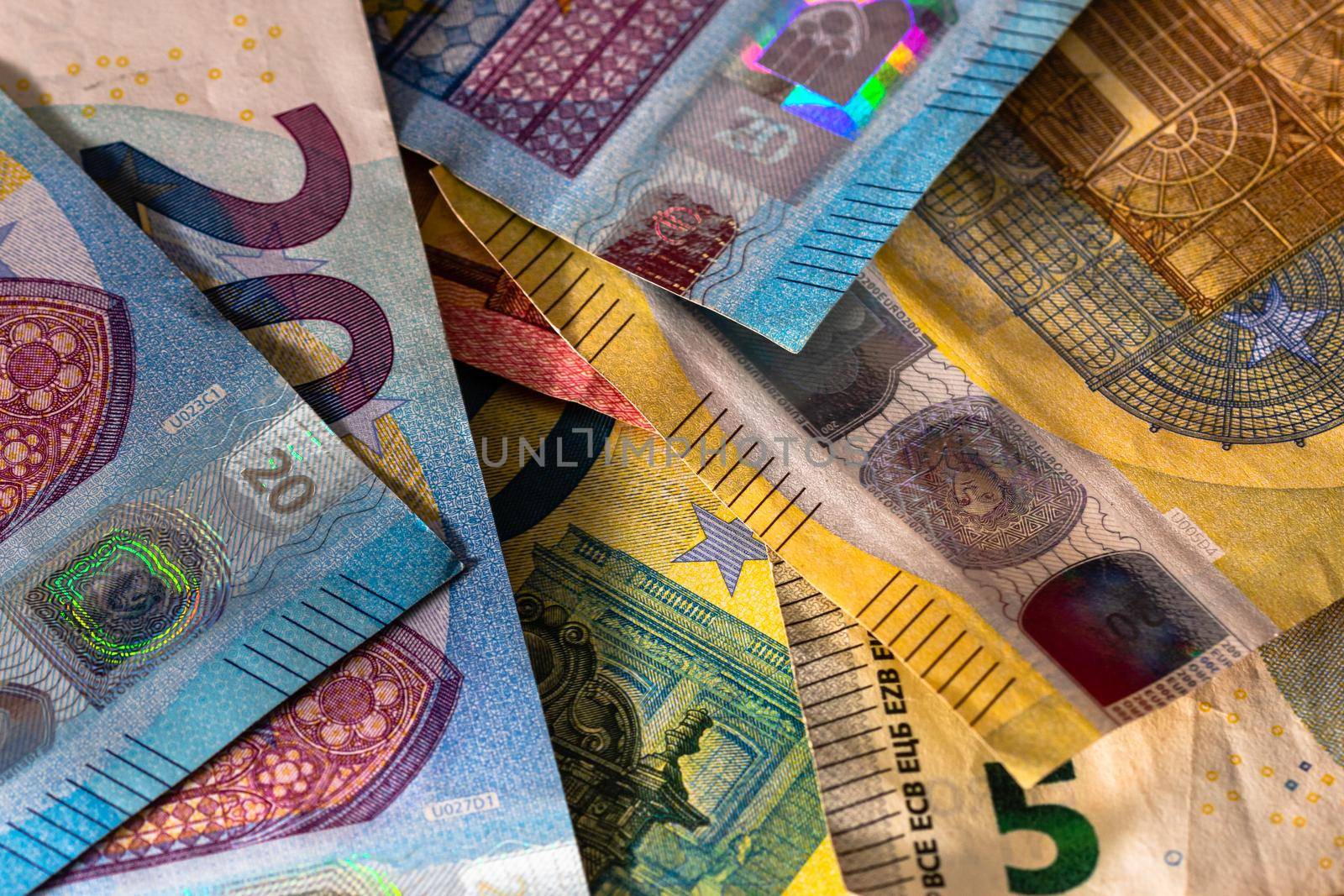 Close up of money euro banknotes, background of money euro isolated. by vladispas