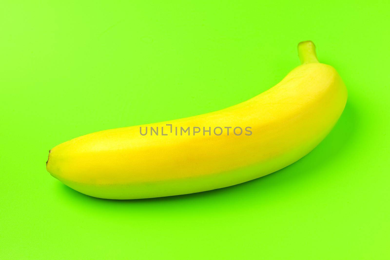 banana on a green background close-up.isolate. High quality photo
