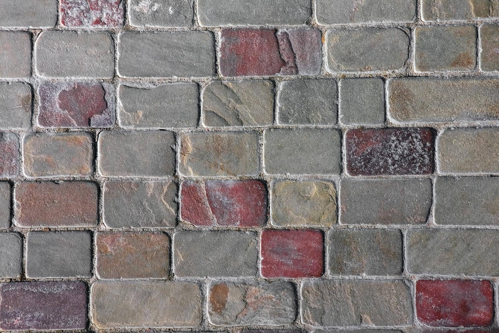 masonry wall paving stones as a background close up. High quality photo