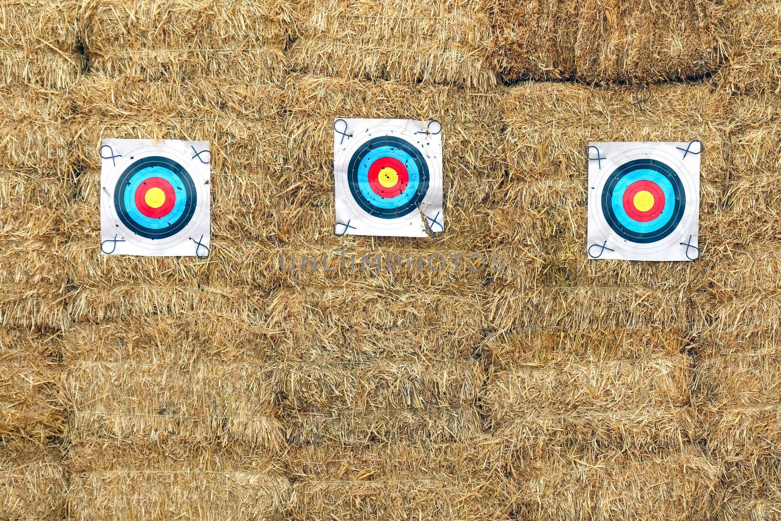 targets for shooting on a straw wall background
