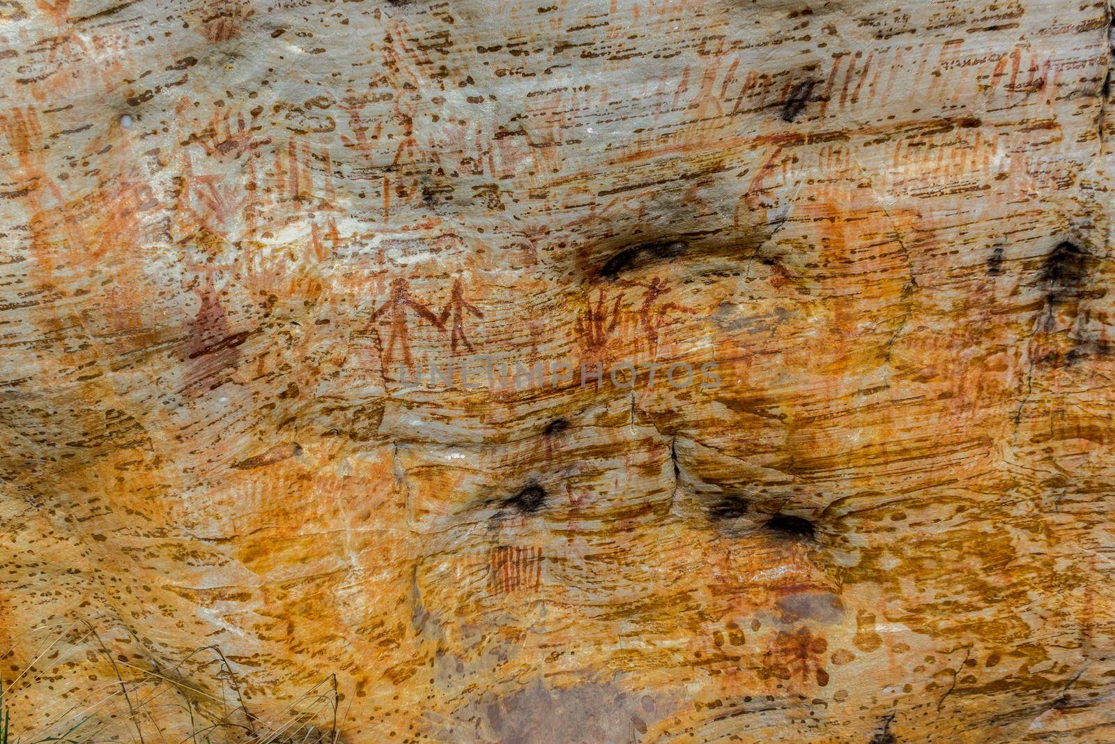 Ancient Aboriginal Art: hand prints, animal herds, spiral in a cave, grampians National park, australia