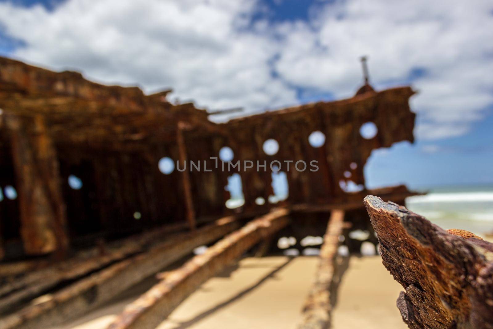 close up of the the Maheno shipwreck on 75 mile beach Fraser Island, Fraser Coast, Queensland, Australia by bettercallcurry