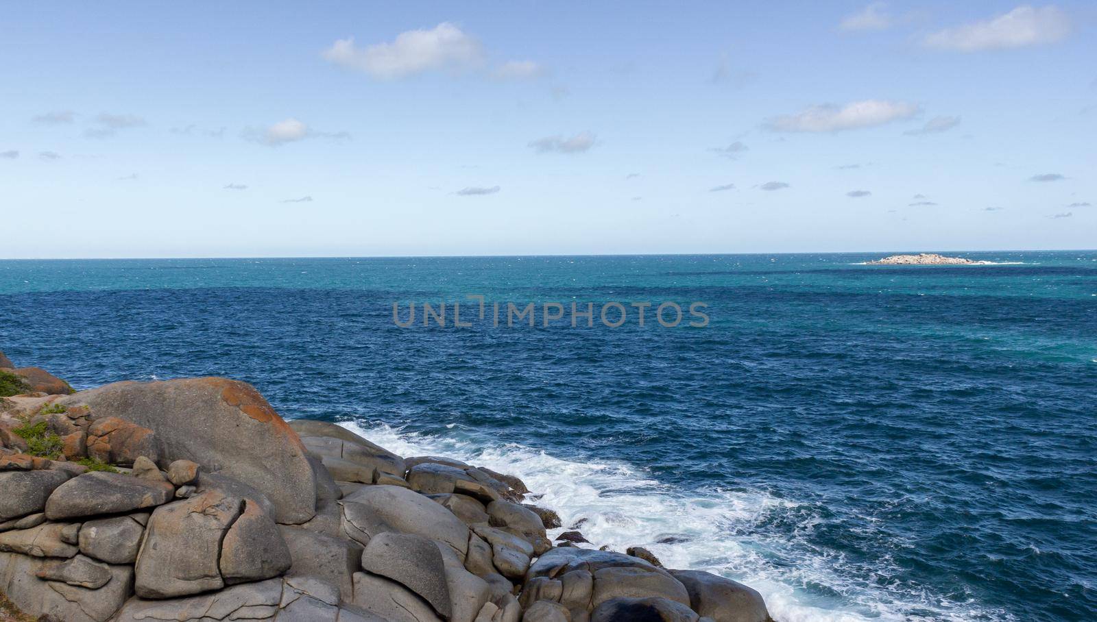 Sea shore and stones. Seascape at midday, australia