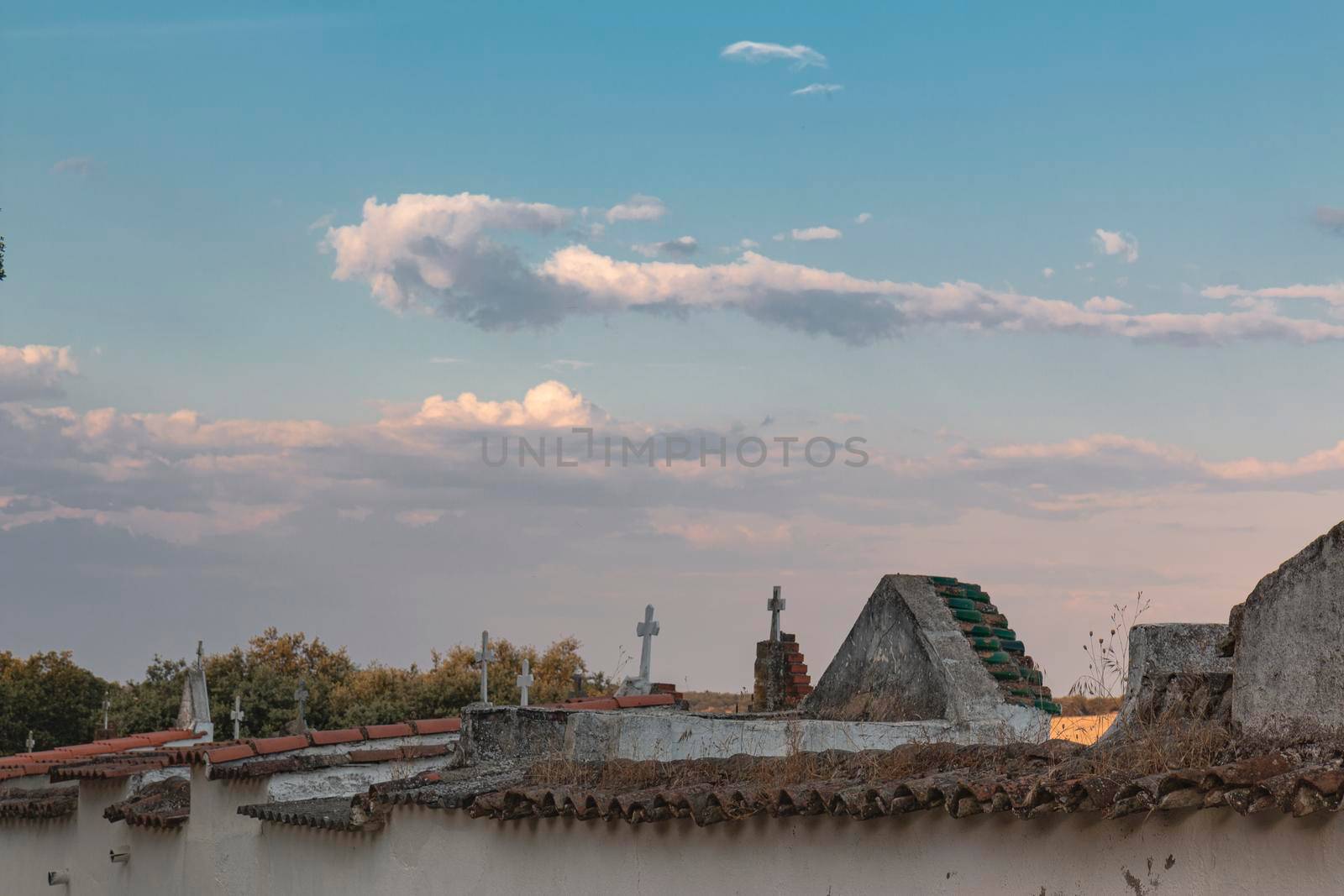 Beautiful couples, fields and landscapes of the Cordoba mountains in Spain. Photograph taken in the month of July. Graveyard in the field