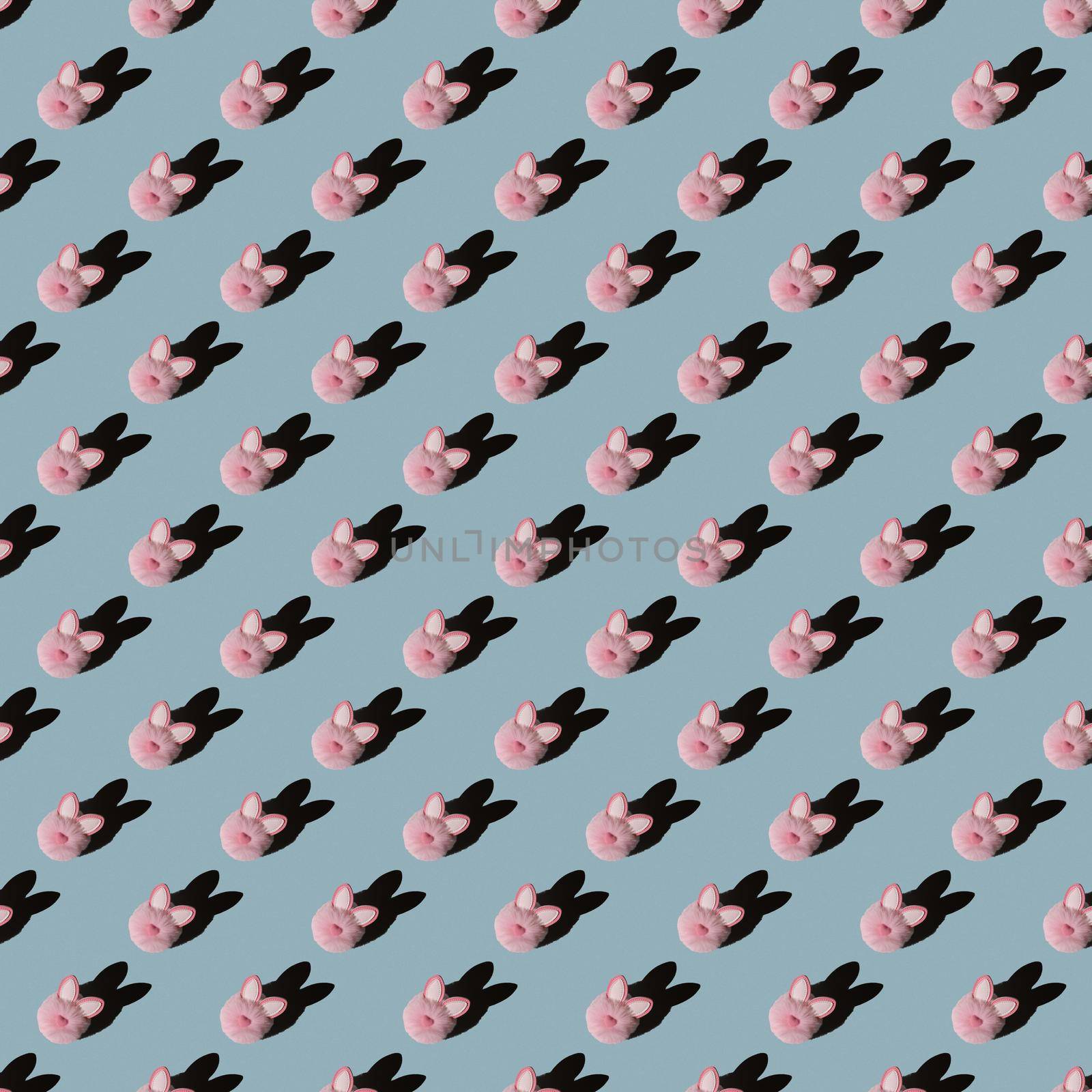 Easter pattern, pink bunny on a blue background. Flat composition with decorative Easter bunny.