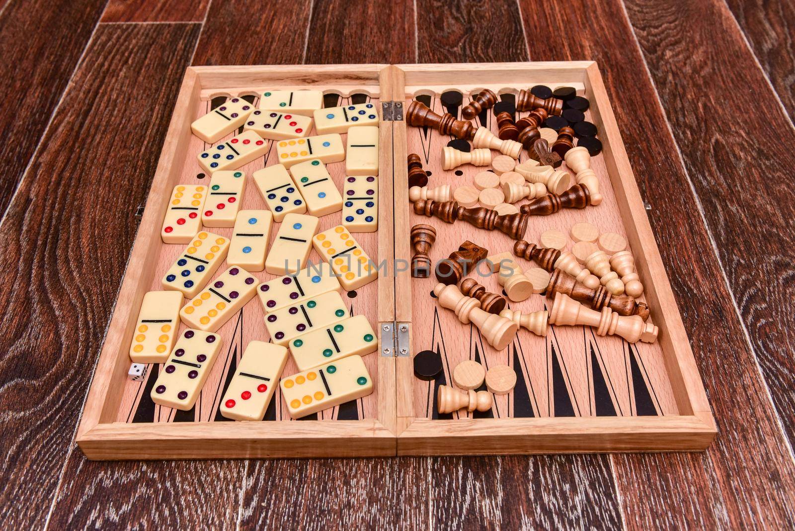 checkers, chess, dominoes and backgammon. set of board games