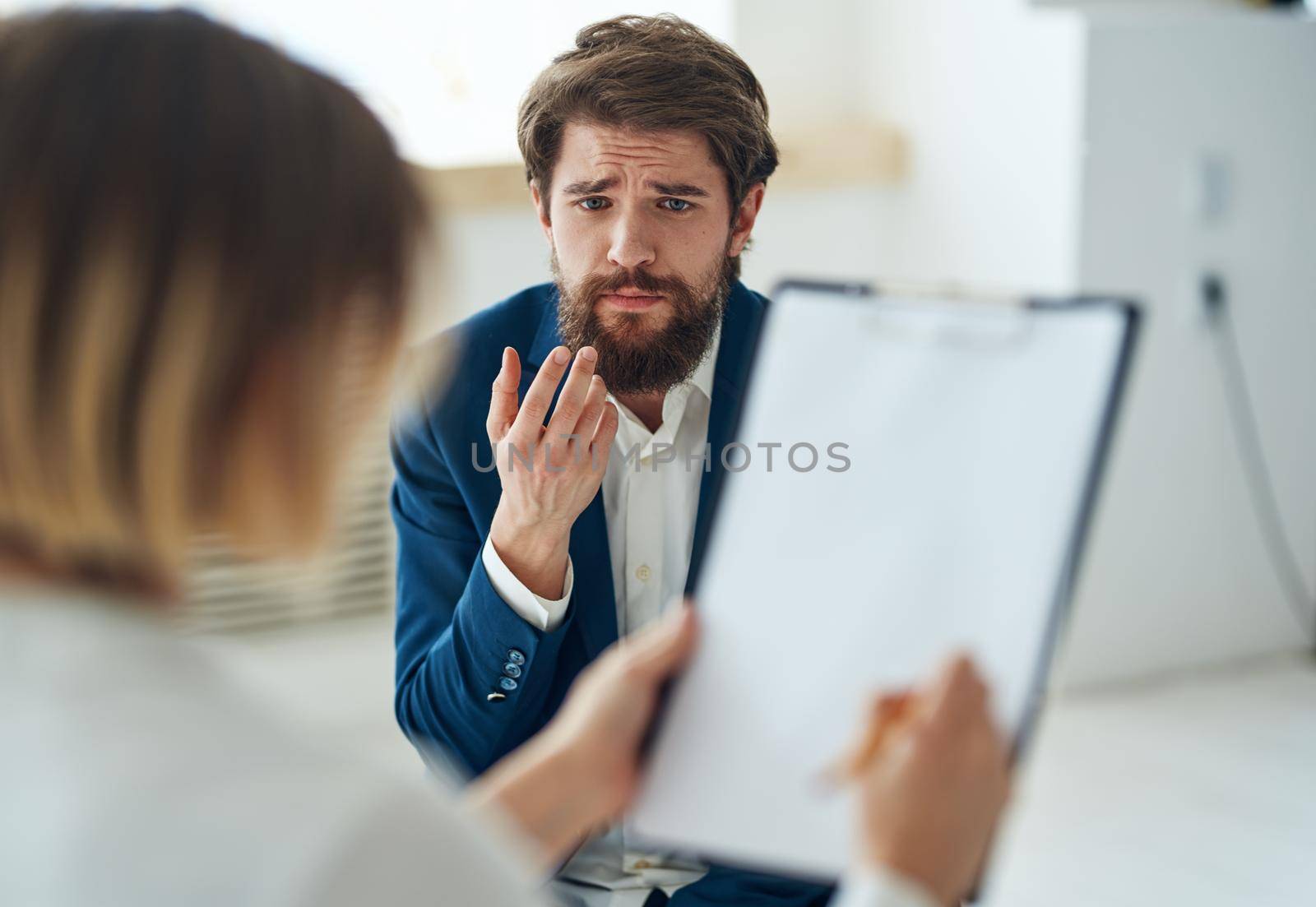 A man at a psychologist's consultation, diagnosis of communication problems. High quality photo