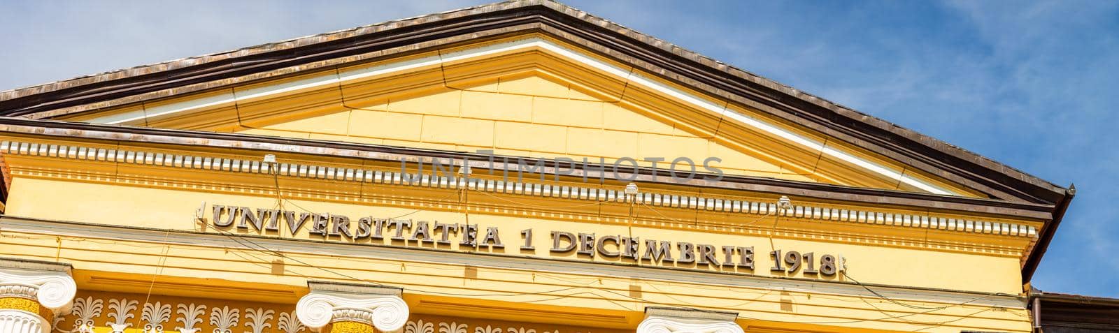 Architectural details, facade of the building of the 1 Decembrie 1918 University, Alba Iulia, Romania, 2021 by vladispas