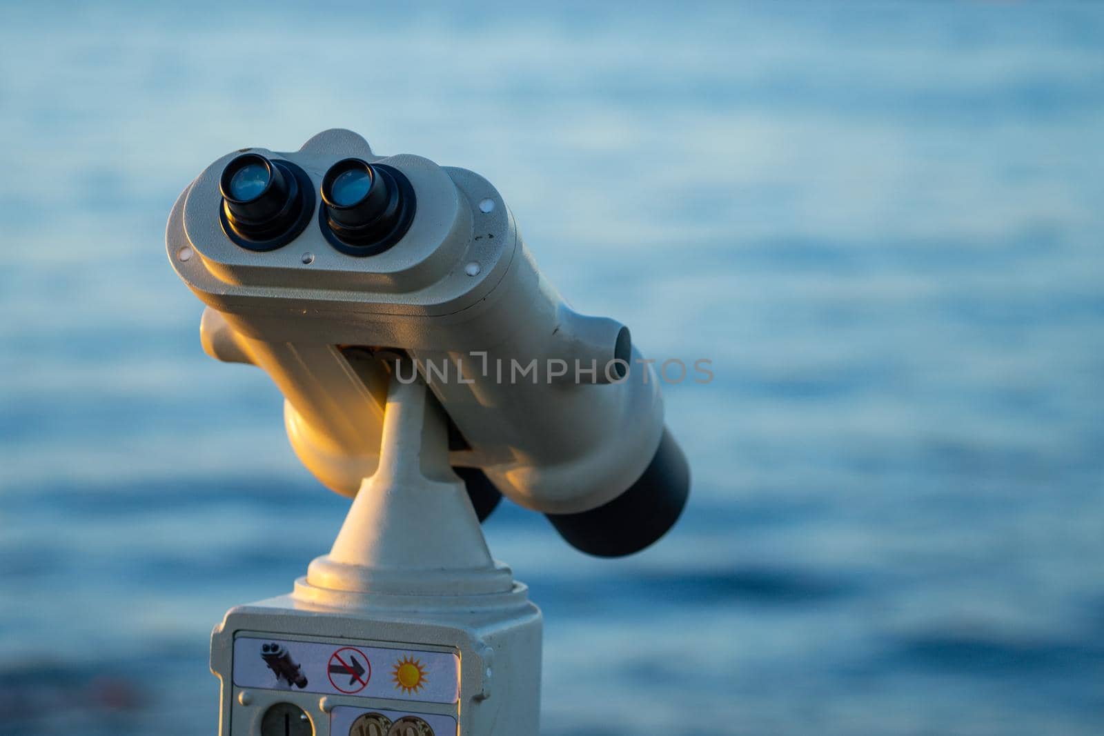 Landscape with a telescope on a blurry background