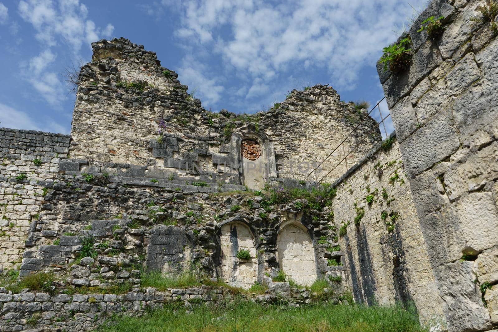 ancient Anakopia fortress in ruins on the background of blue sky. New Athos,Abkhazia