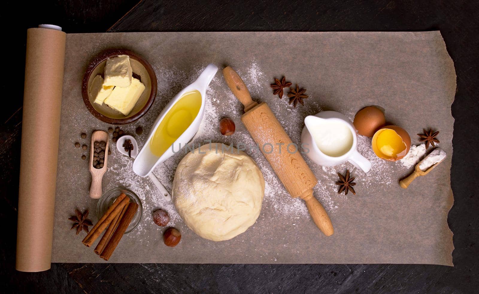 The ingredients for baking cupcake with raisins.