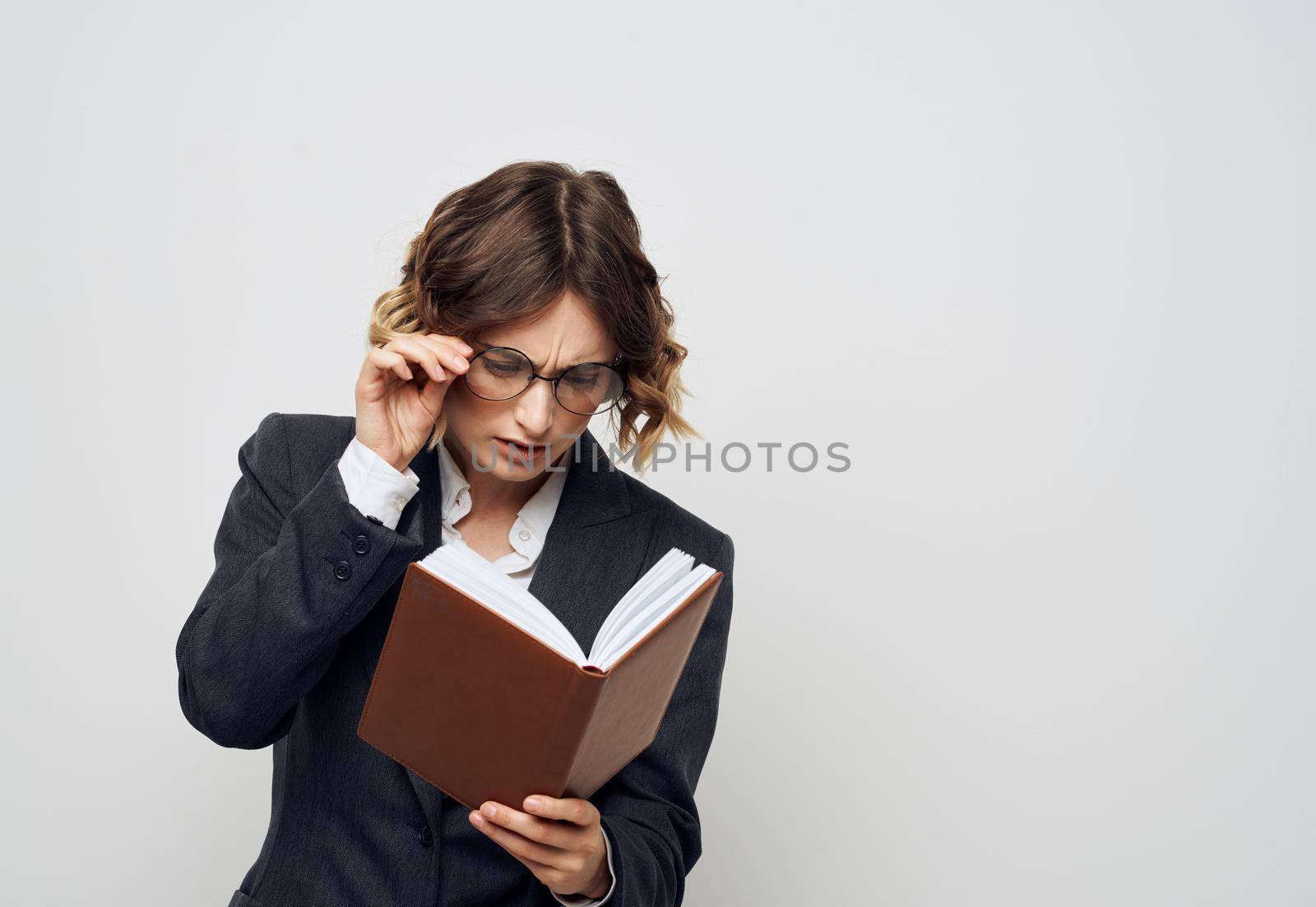 Woman documents glasses classic suit business finance Copy Space. High quality photo
