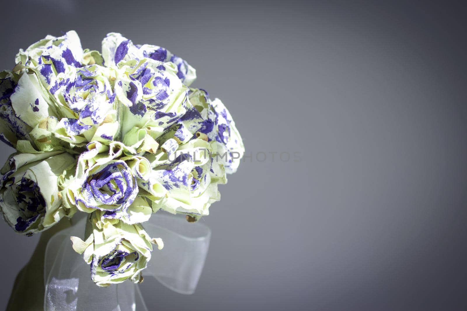 Bridal bouquet made with paper. Blue and beige color. No people