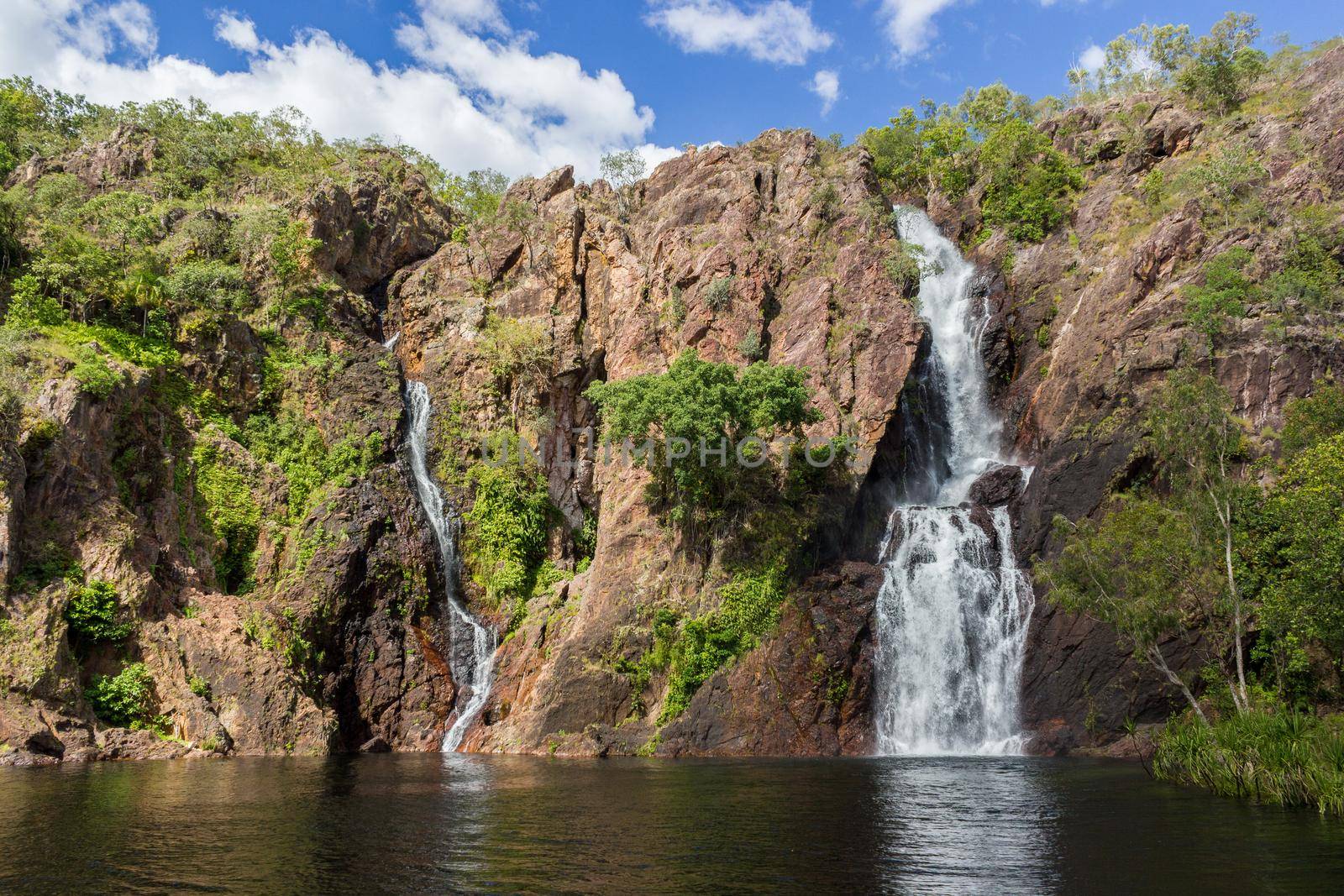 beautiful wangi waterfalls in litchfield national park, northern territory by bettercallcurry