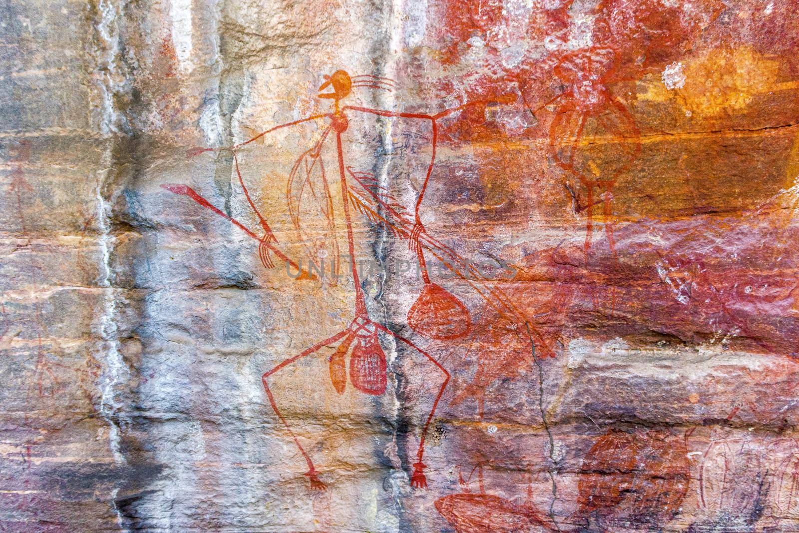 Ancient Aboriginal Art: hand prints, animal herds, spiral, Kakadu National Park, Australia by bettercallcurry