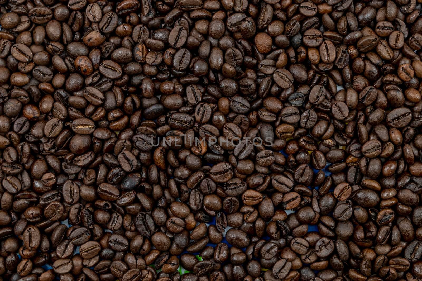 texture of roasted coffee beans ready for grinding