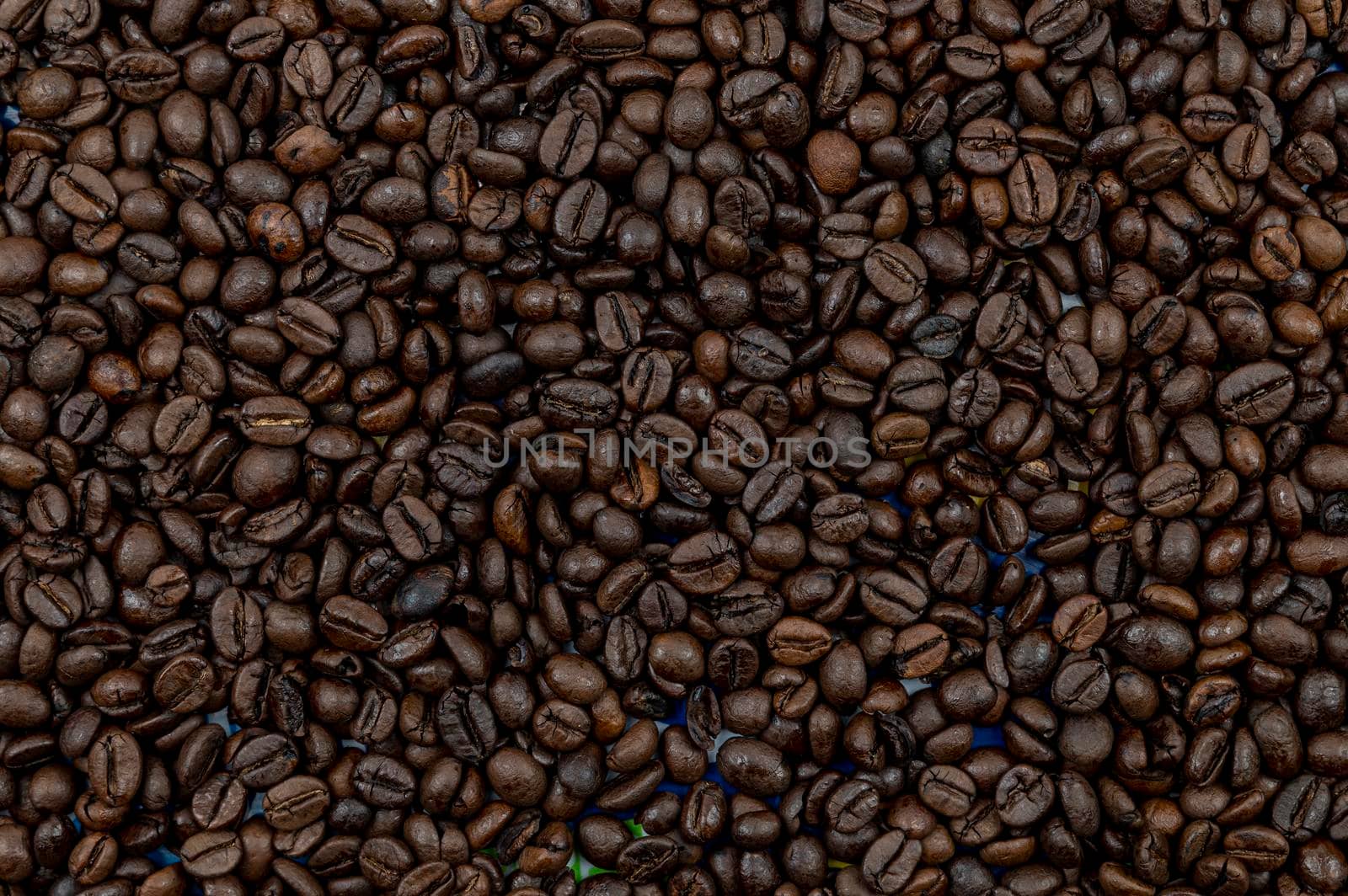 texture of roasted coffee beans ready for grinding