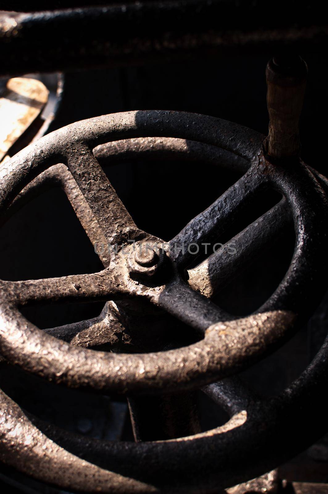 Large black manual handwheel in a control valve by karpovkottt