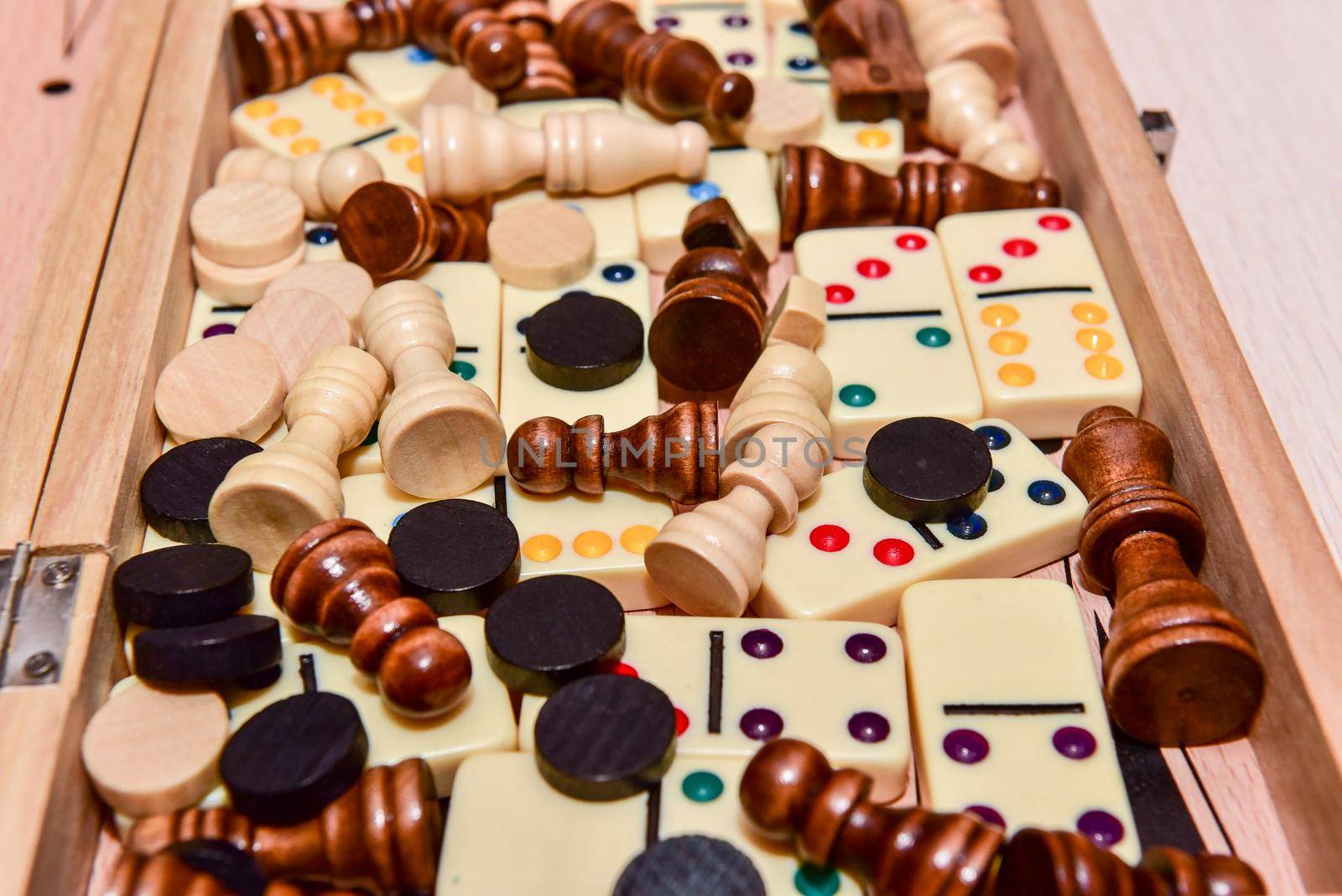 checkers, chess, dominoes and backgammon. set of board games