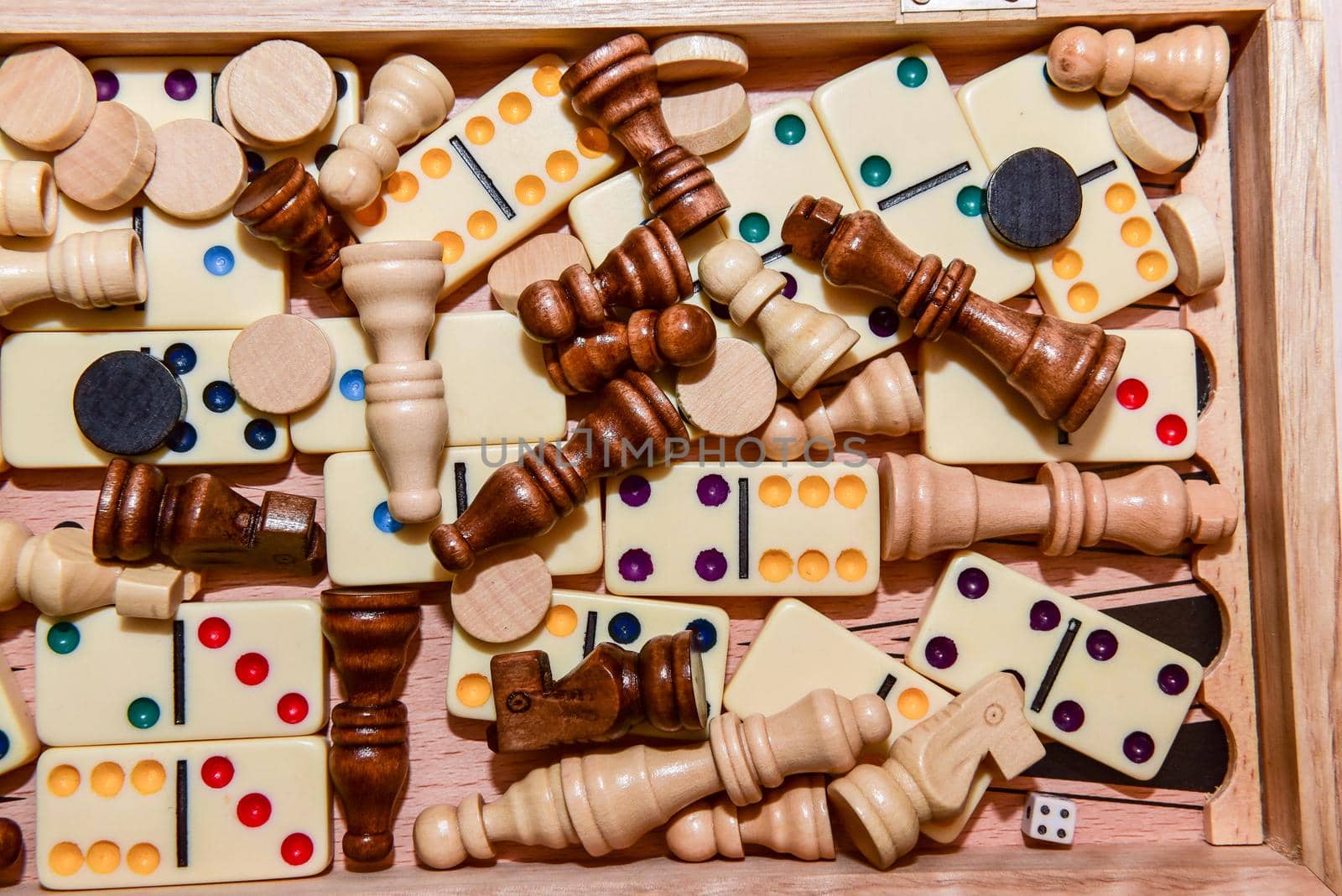 A variety of board game pieces. A background miscellaneous board game pieces.