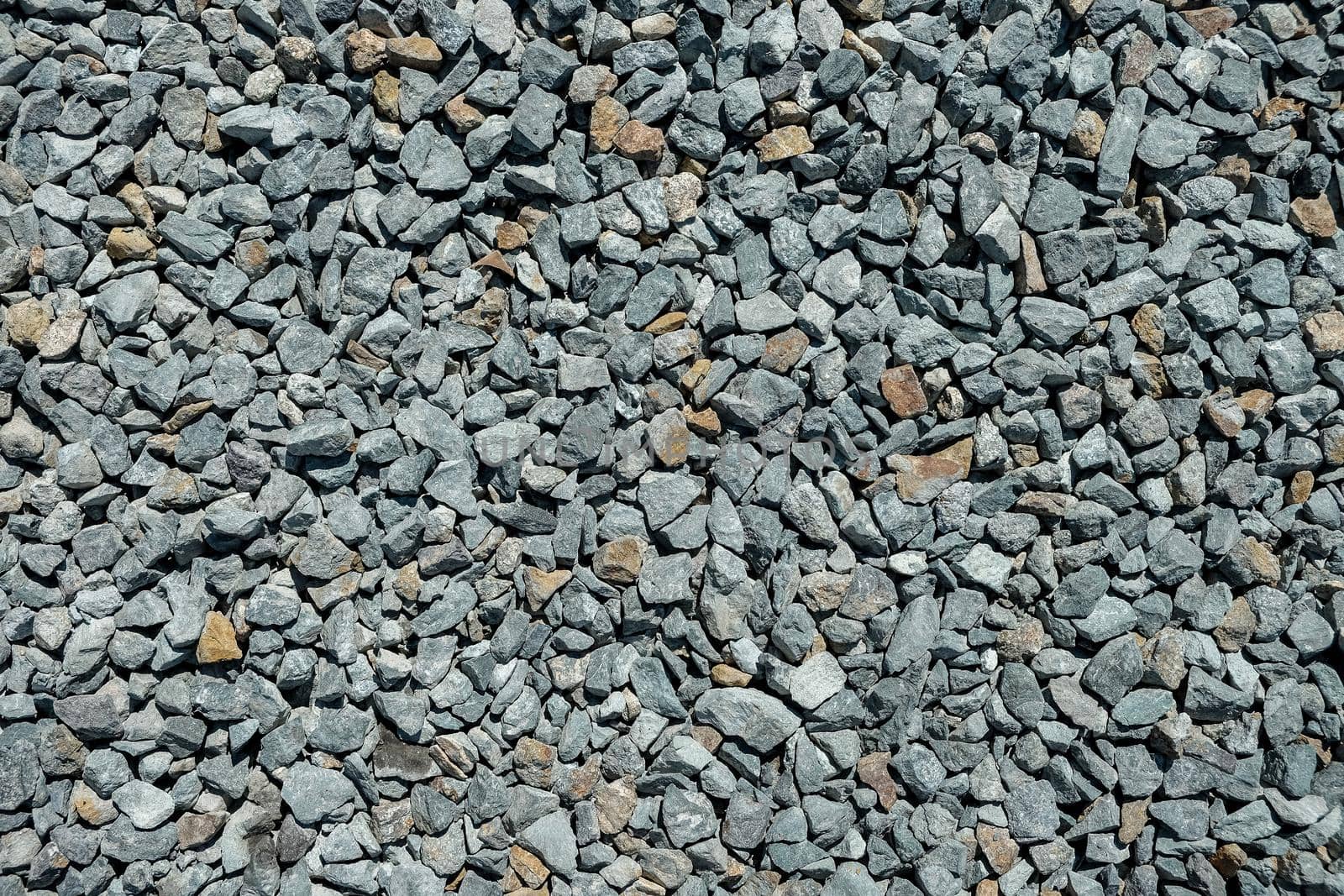 Road gravel. Gravel texture. Crushed Gravel background. Pile of Stones texture. Industrial coals.