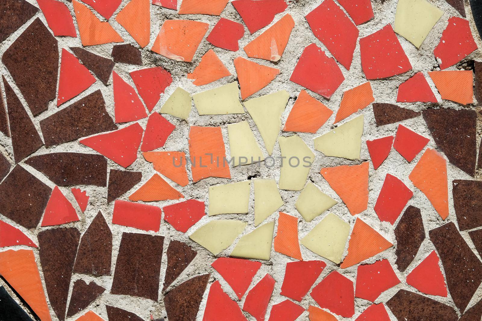 Colorful ceramic mosaic floor or wall. mosaic top view. Bathroom or kitchen floor wall design idea. Reused broken tile. Interior design. Colored eastern pottery.