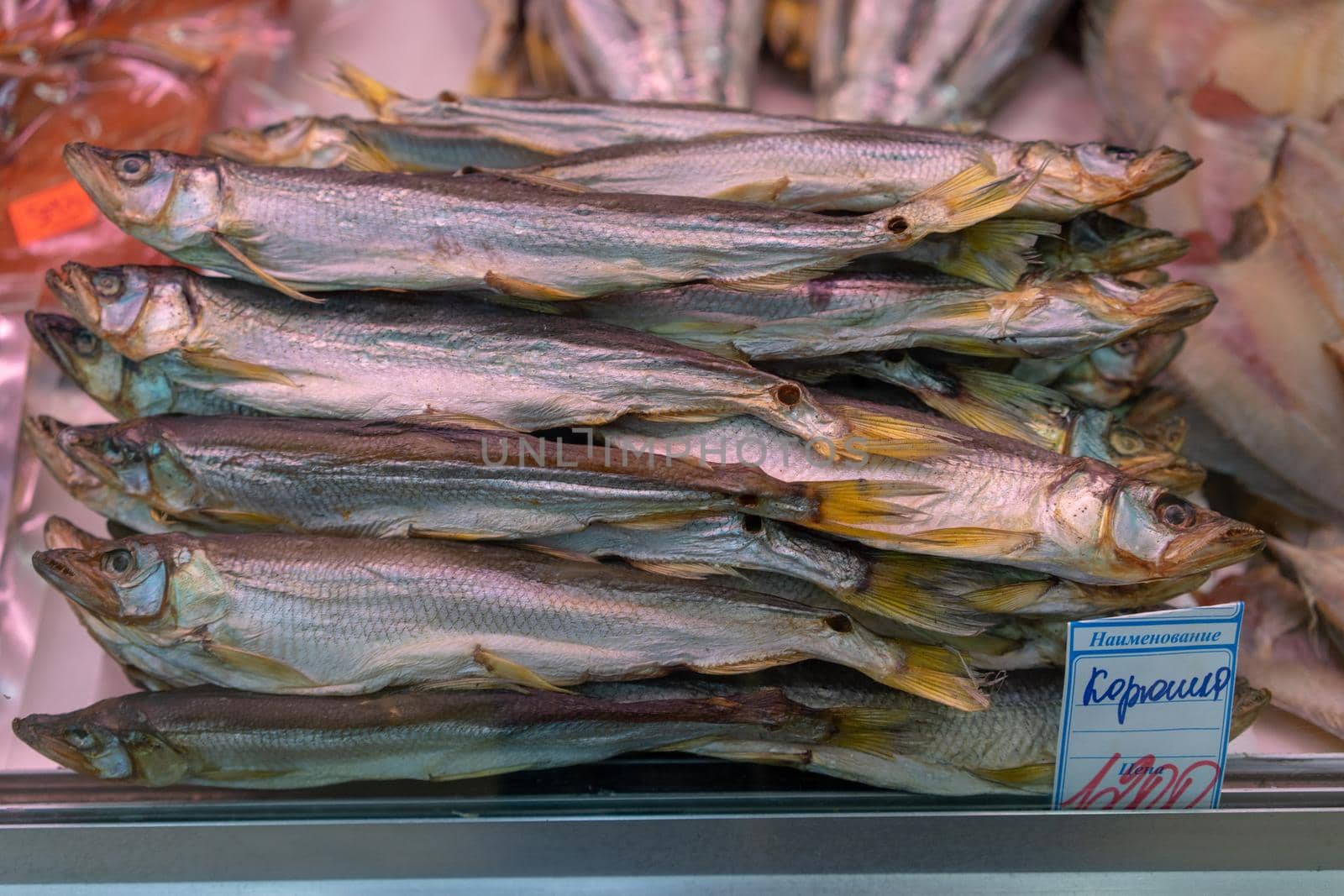 Petropavlovsk-Kamchatsky, Russia-October 6, 2019: Dried and smoked fish in the seafood market showcase.