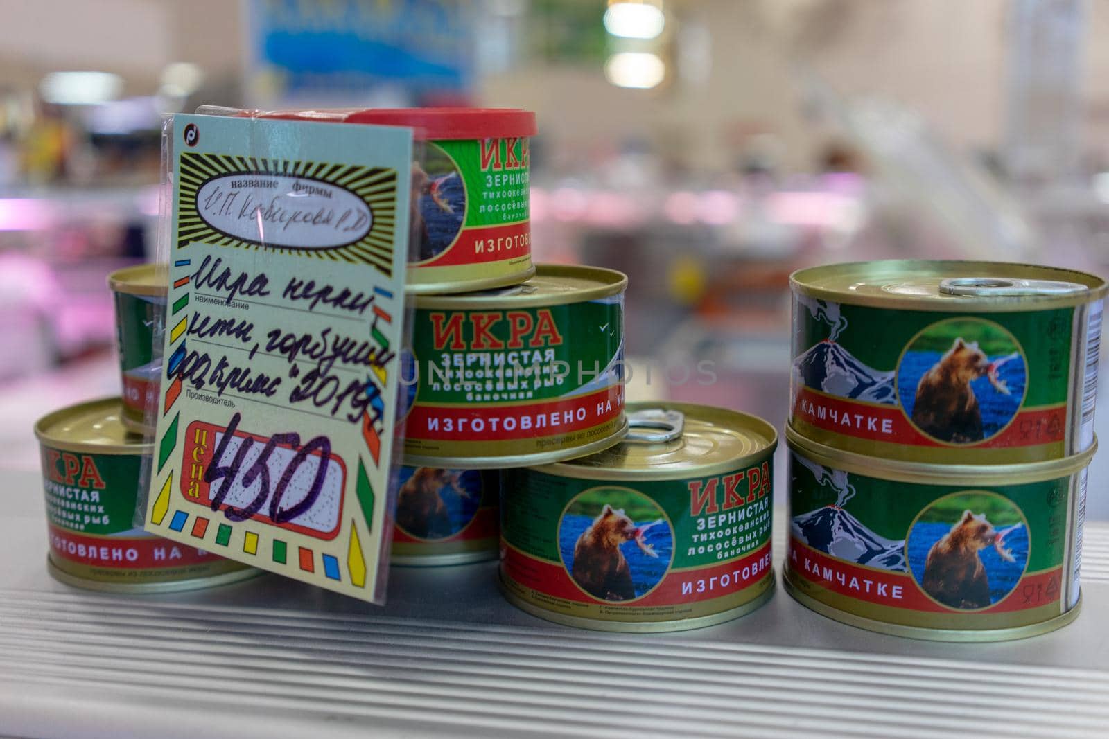 Petropavlovsk-Kamchatsky, Russia-October 6, 2019: red caviar in jars at the seafood market showcase.