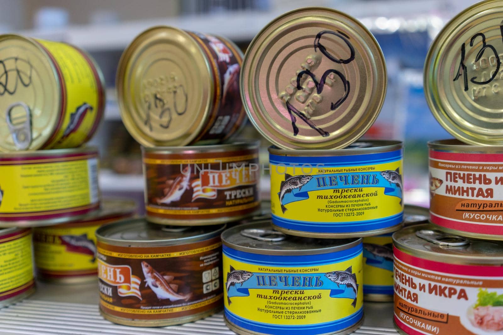 Petropavlovsk-Kamchatsky, Russia-October 6, 2019: canned Fish in the seafood market showcase.