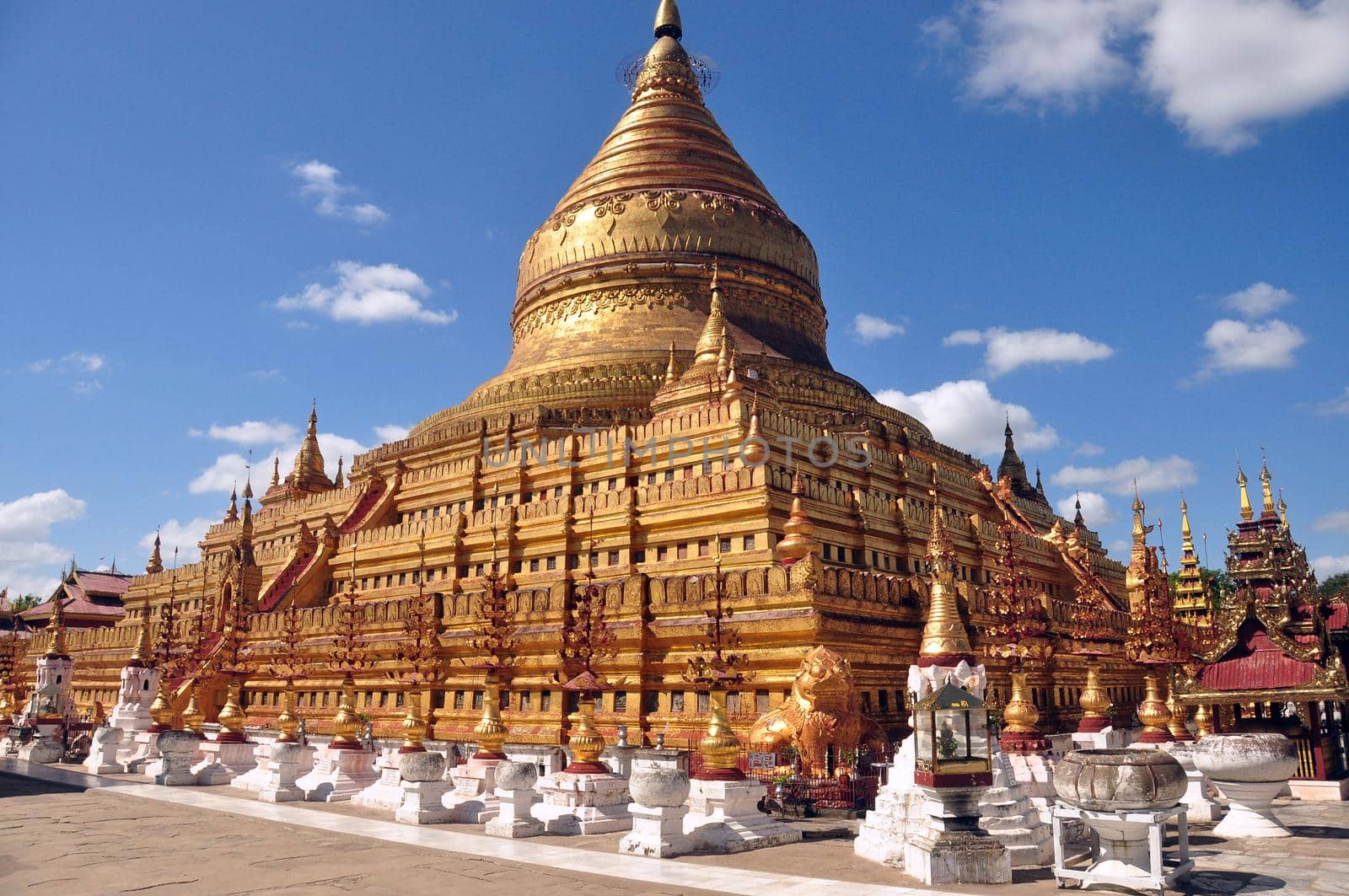 BAGAN, MYANMAR - NOVEMBER 18, 2015: Sacred Shwezigon pagoda. Golden paya, buddhist temple in old ancient capital in Burma. Famous tourist destination. Mingalazedi Sulamani Shwezigon Ananda Htilominlo