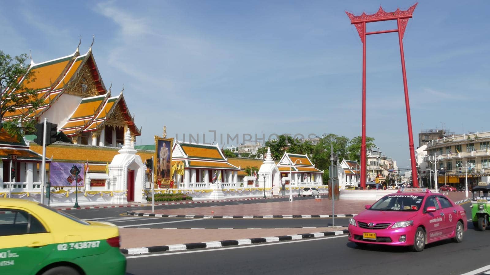 BANGKOK, THAILAND - 11 JULY, 2019: Giant Swing religios historic monument near traditional wat Suthat buddist temple. Iconic city view, cultural symbol. Famous landmark and classic tourist attraction