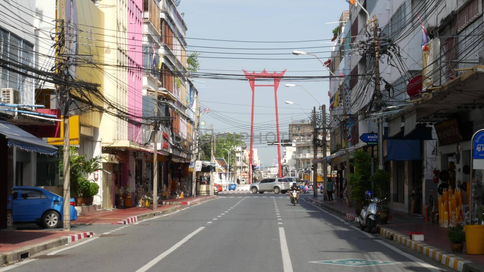 BANGKOK, THAILAND - 11 JULY, 2019: Giant Swing religios historic monument near traditional wat Suthat buddist temple. Iconic city view, cultural symbol. Famous landmark and classic tourist attraction