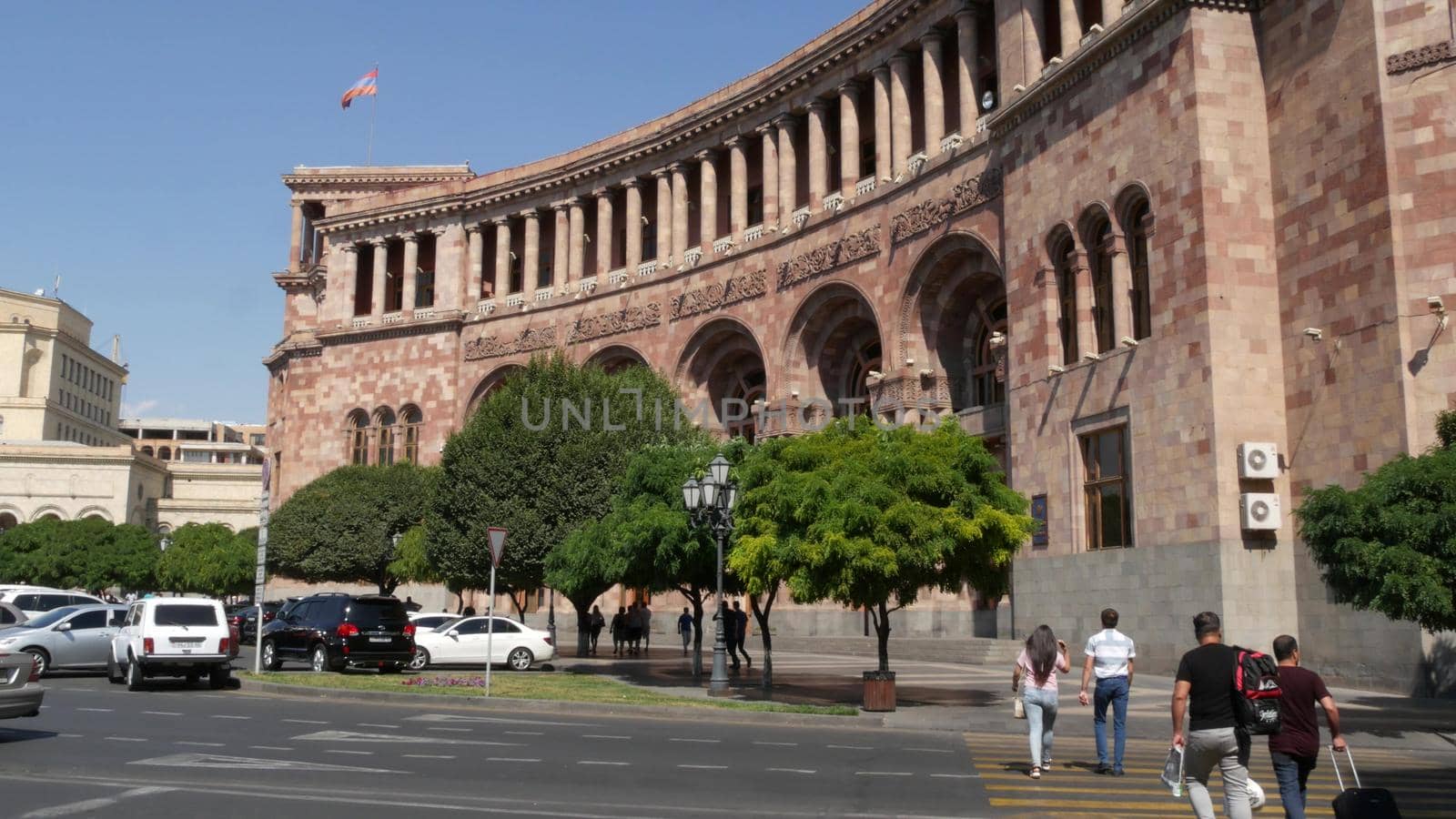 YEREVAN, ARMENIA, CAUCASUS - 28 AUGUST 2019: Central Republic Square, caucasian armenian capital, soviet architectural heritage, downtown classical street city life on sunny day. Kentron architecture.