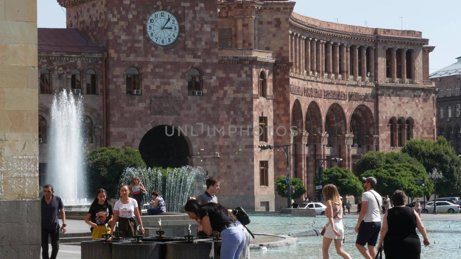 YEREVAN, ARMENIA, CAUCASUS - 28 AUGUST 2019: Central Republic Square, caucasian armenian capital, soviet architectural heritage, downtown classical street city life on sunny day. Kentron architecture.