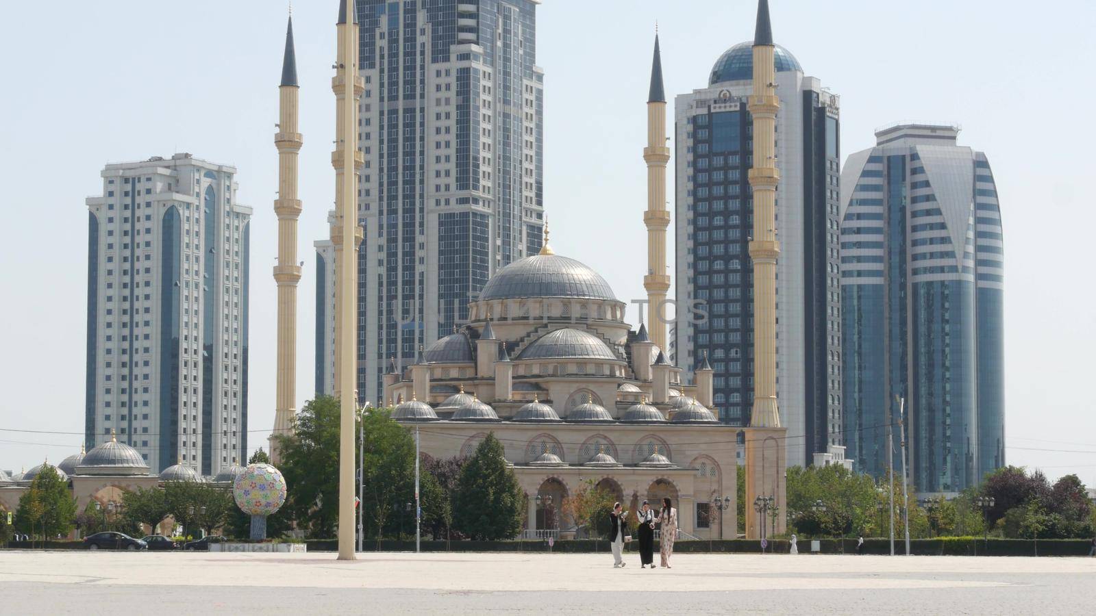 GROZNY, THE CHECHEN REPUBLIC OF ICHKERIA, CAUCASUS, RUSSIA - 6 SEPTEMBER 2019: Day of Civil Concord and Unity celebration in capital near The Heart of Chechnya. People on square near islamic mosque