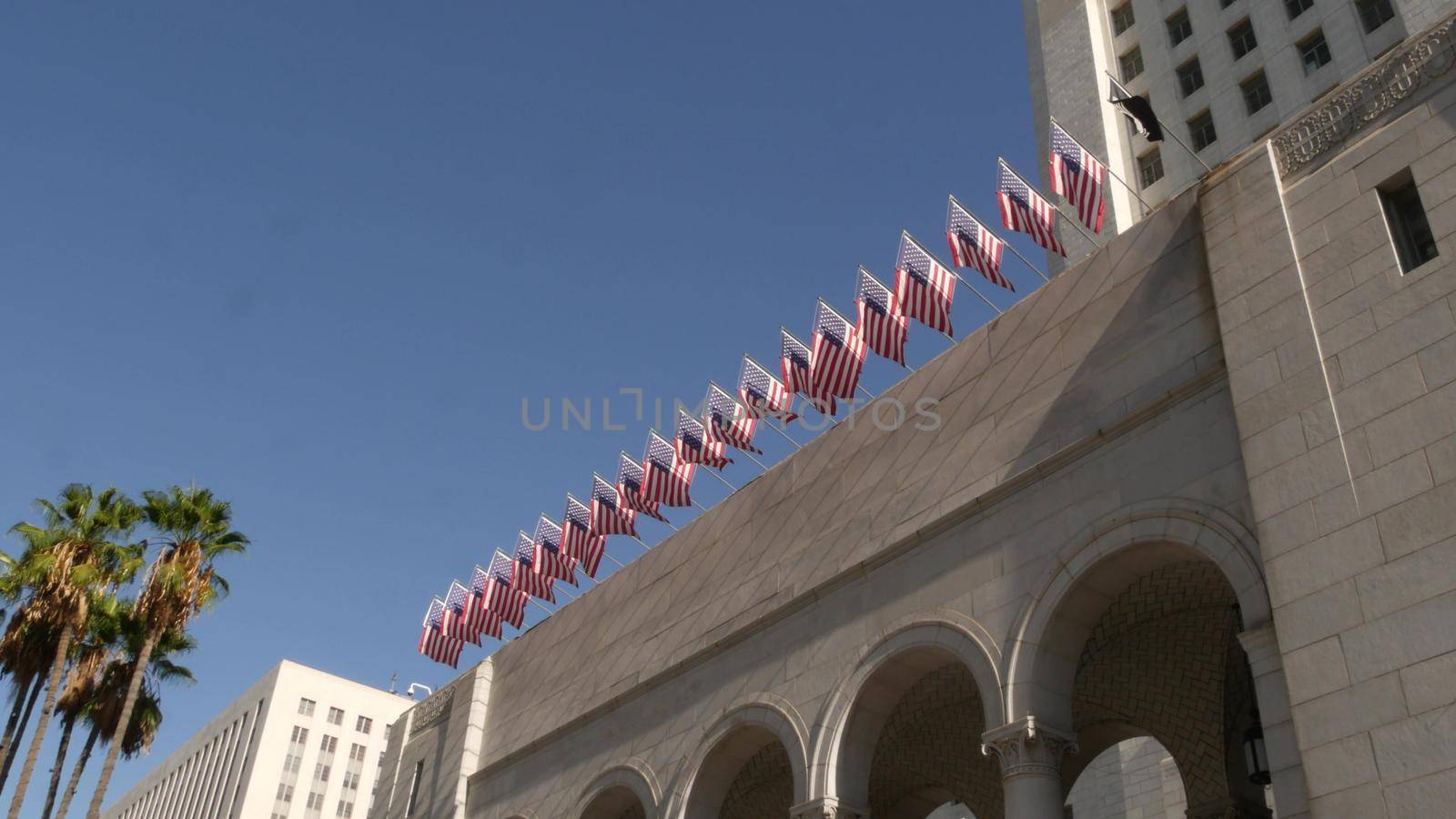 LOS ANGELES, CALIFORNIA, USA - 30 OCT 2019: City Hall highrise building exterior in Grand Park. Mayor's office in downtown. Municipal civic center, federal authority, headquarters of government in LA.