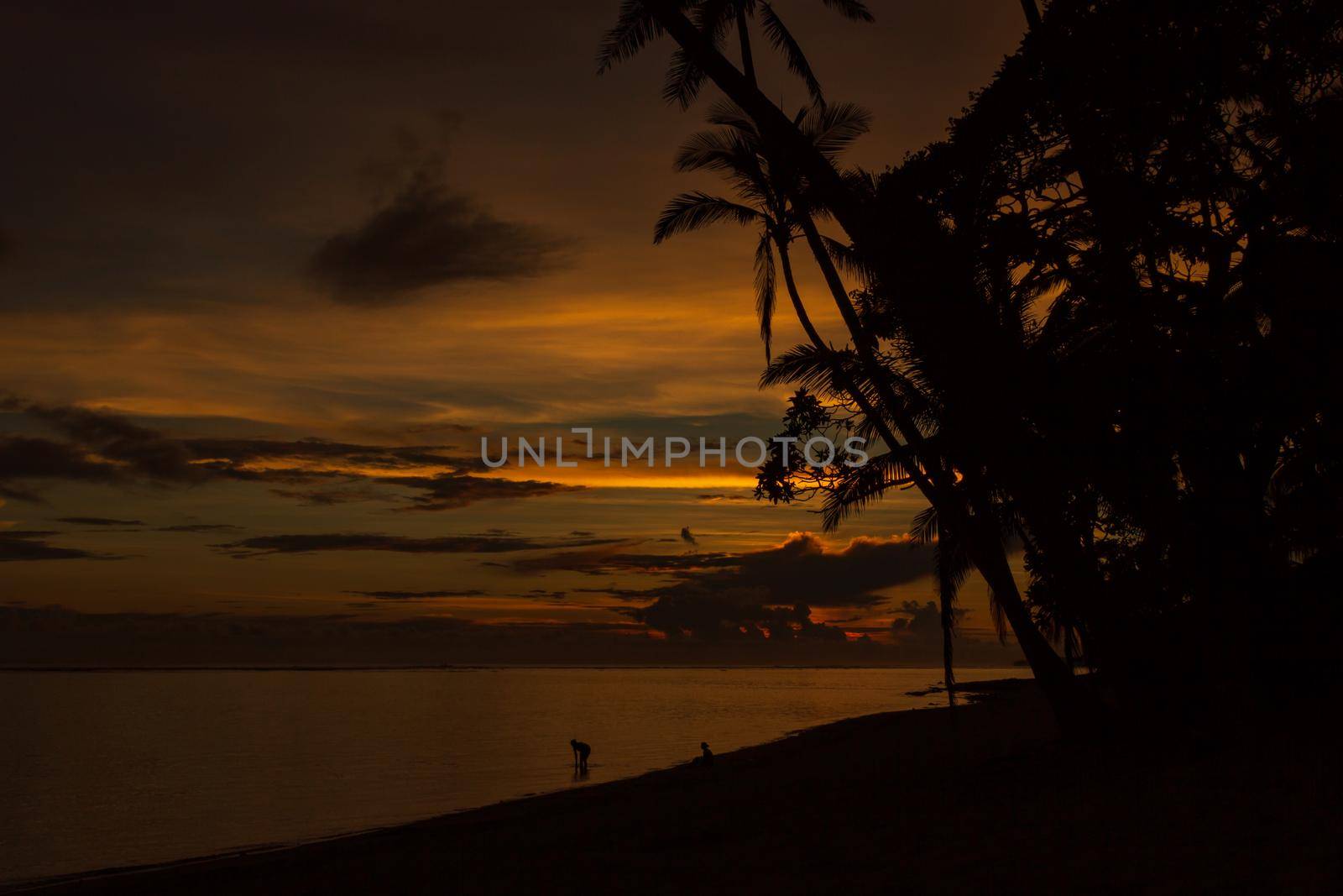 Colorful sunrise on Tambua Sands Beach on Fiji Island, Fiji.