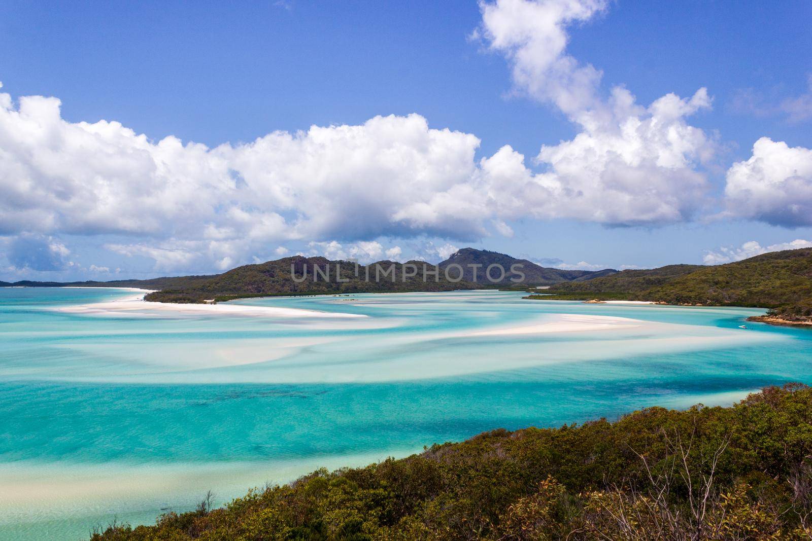 Whiteheaven beach on a beautiful sunny day with clouds, Whitsunday Island, Queensland, Australia by bettercallcurry