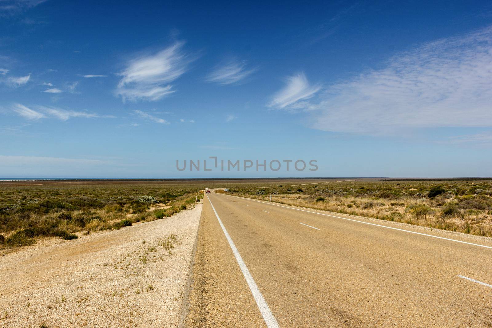 cars on the Eyre Highway at the nullarbor dessert of Australia, South Australia, Australia by bettercallcurry