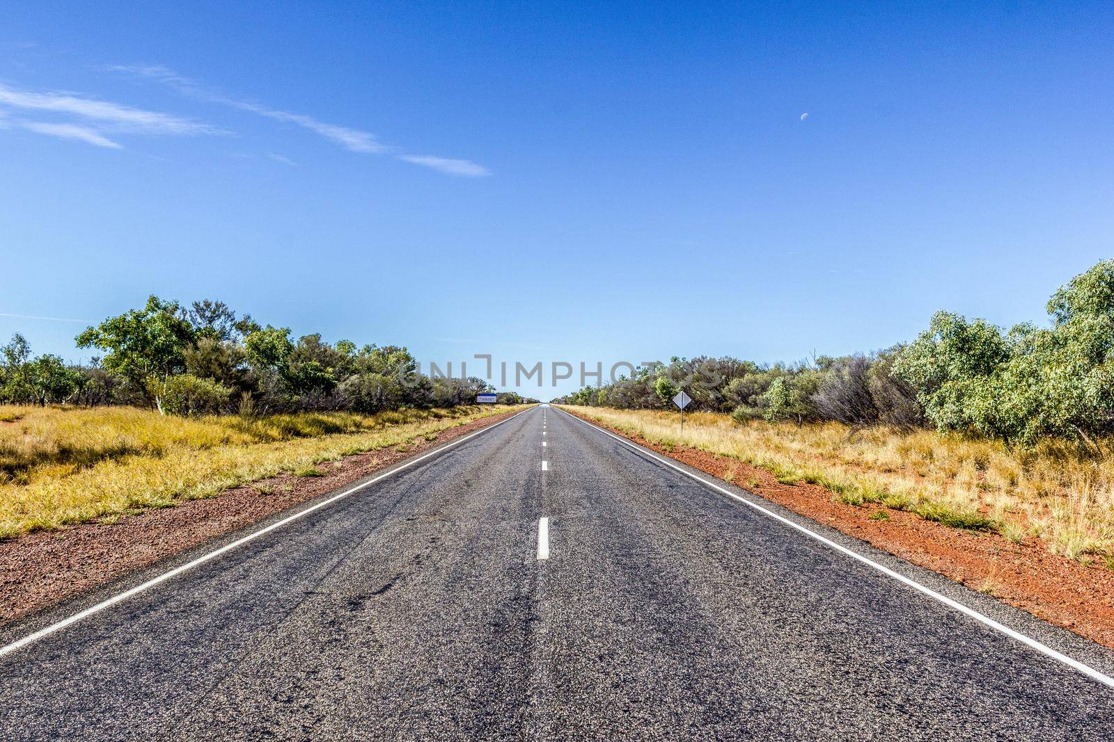 straight road through the dessert of Australia, South Australia, Stuart Highway Australia by bettercallcurry