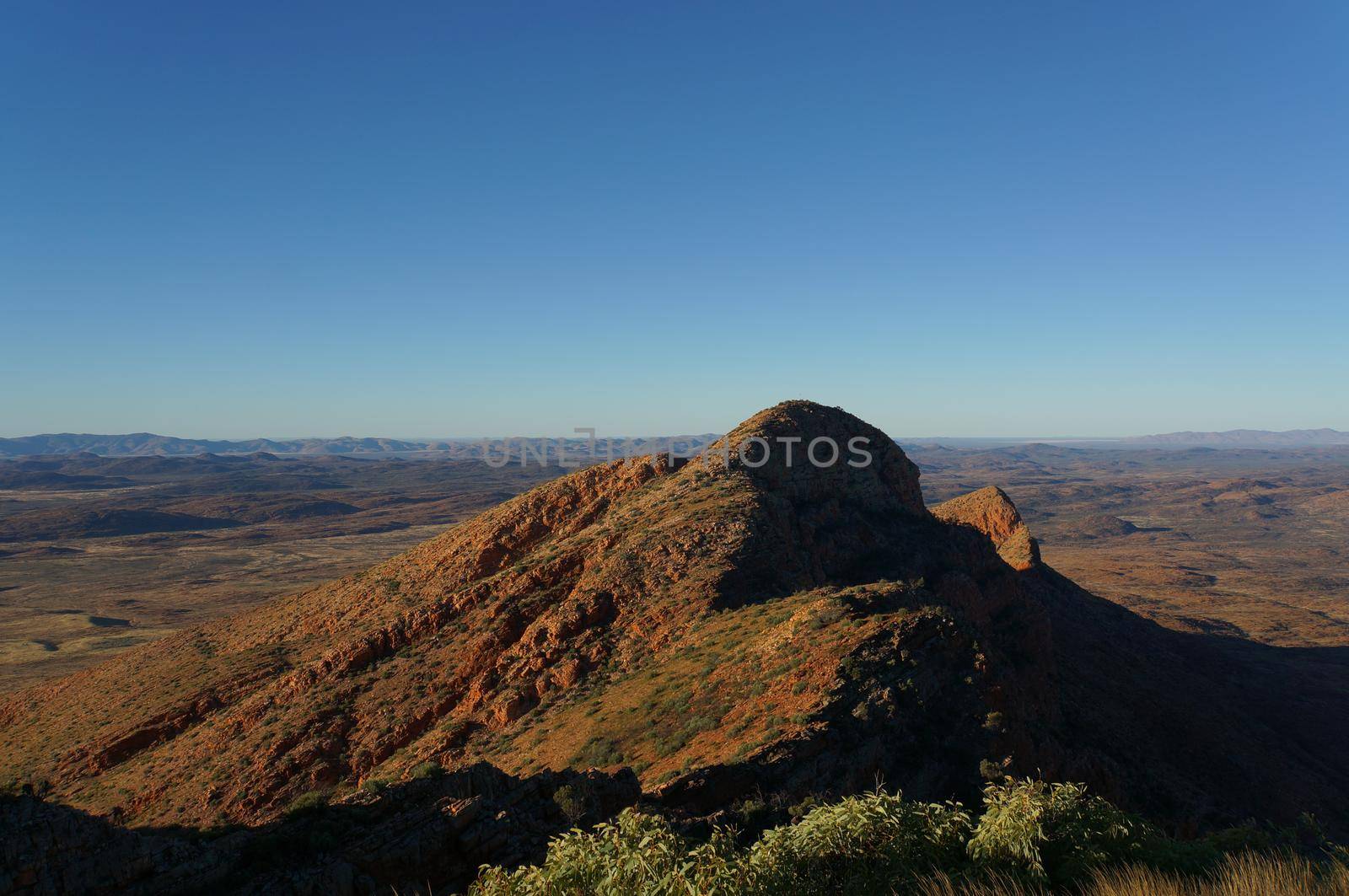 Hiker at the top of Mount Gillen just outside Alice Springs in central Australia.